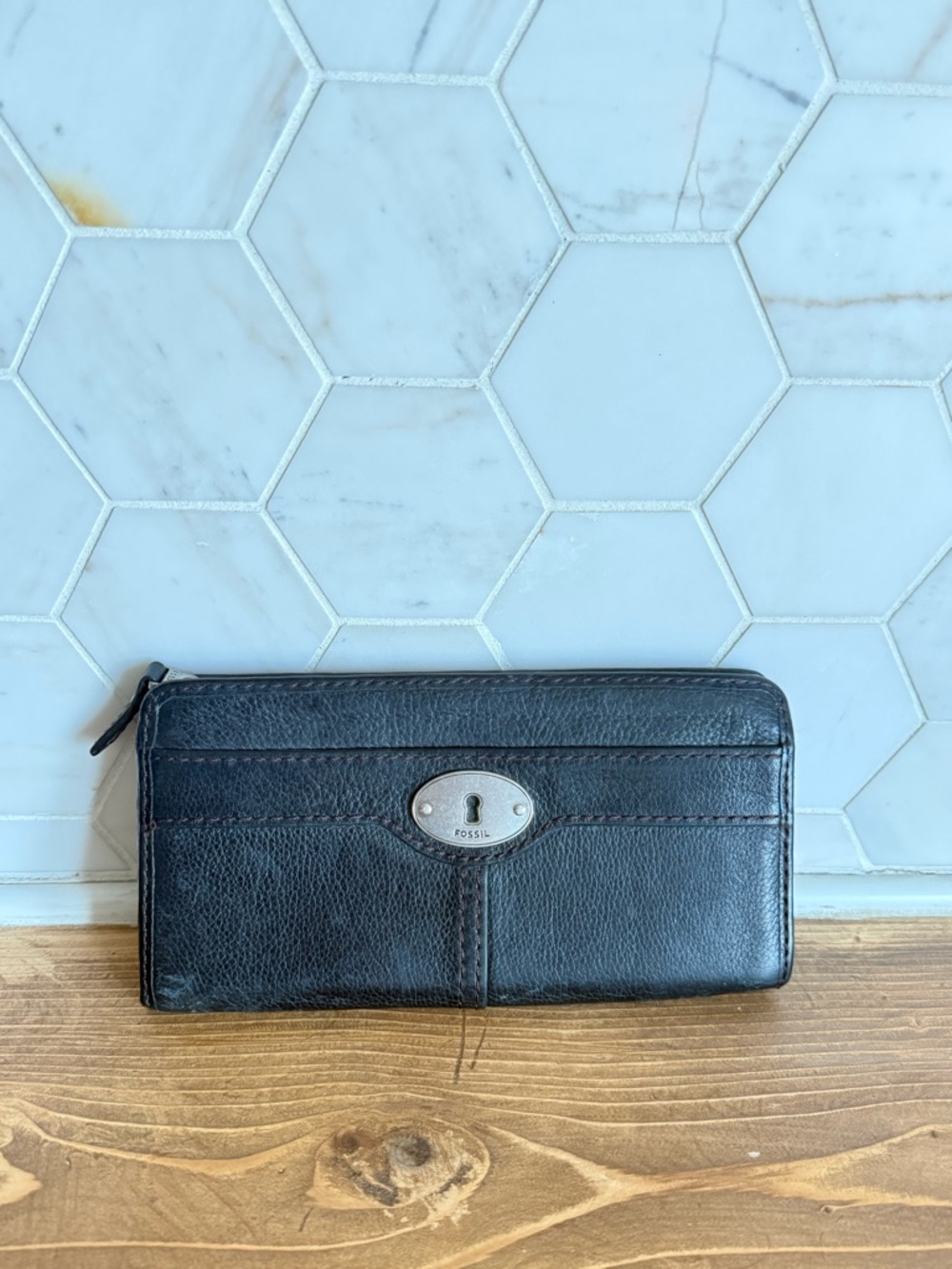 Fossil Black Leather Zip-Around Wallet with Metal Emblem